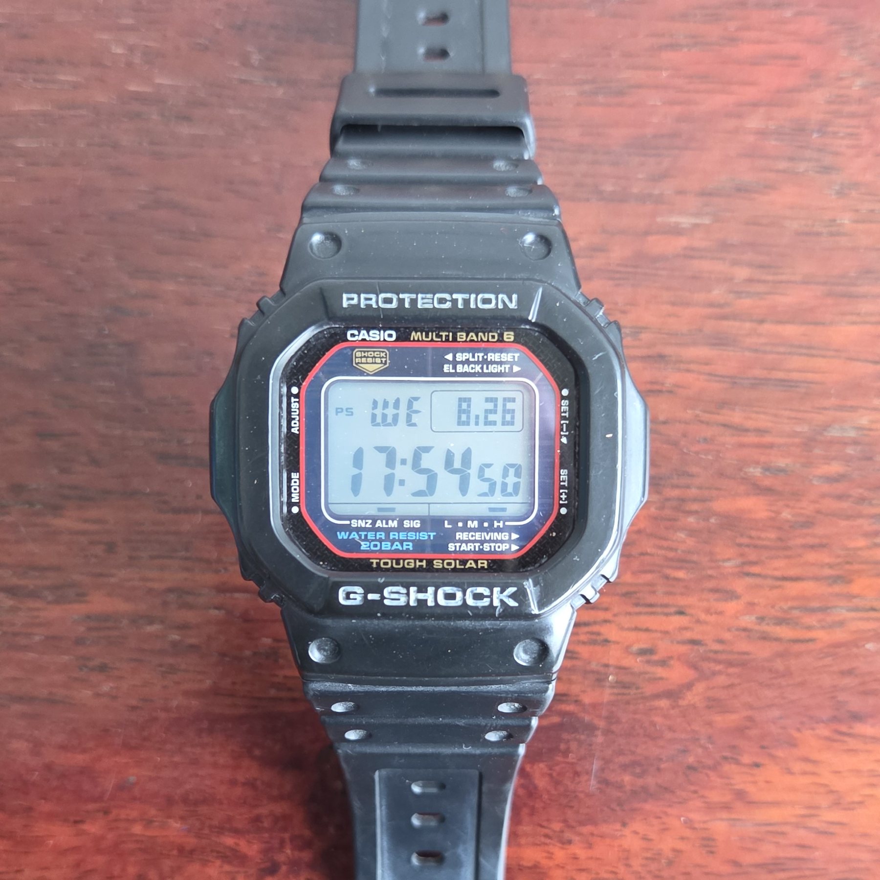 The same watch at a slight angle, showing the depth of the resin case.