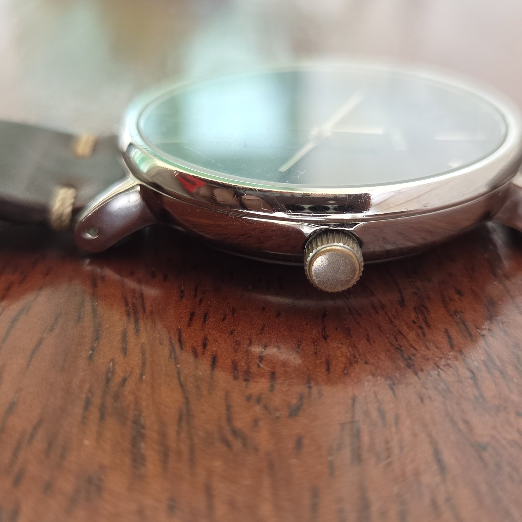 Profile view showing the polished case side and the crown.