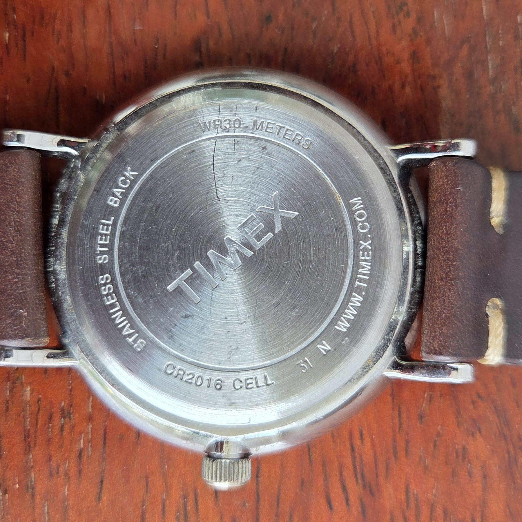 The stainless steel case back, stamped with the Timex logo and the water resistance rating.